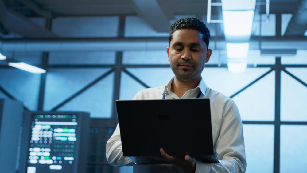 Someone working in cybersecurity after getting recruited